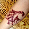Temporäres Tattoo mit bordeauxroter Henna‑Farbe von Golecha